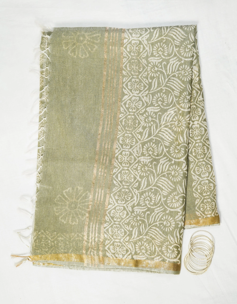 Hovered view of Green With White Floral Motifs And Gold Border Linen Saree