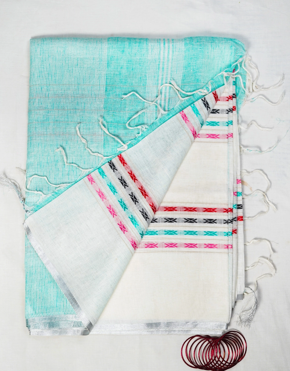 Hovered view of White Body With Aqua Blue Pallu And Multicolour Woven Stripes Linen Saree