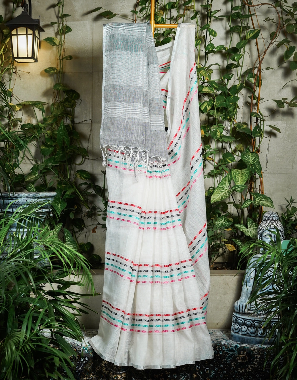 Off White Body With Aqua Blue Pallu And Multicolour Woven Accents Linen Saree