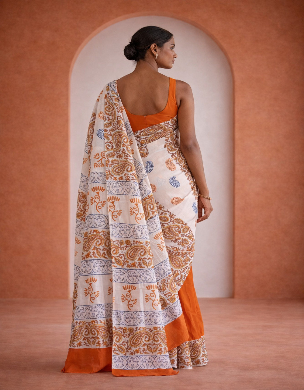 Hovered view of White And Bright Orange Cotton Printed Saree With Blue Kalamkari Motifs