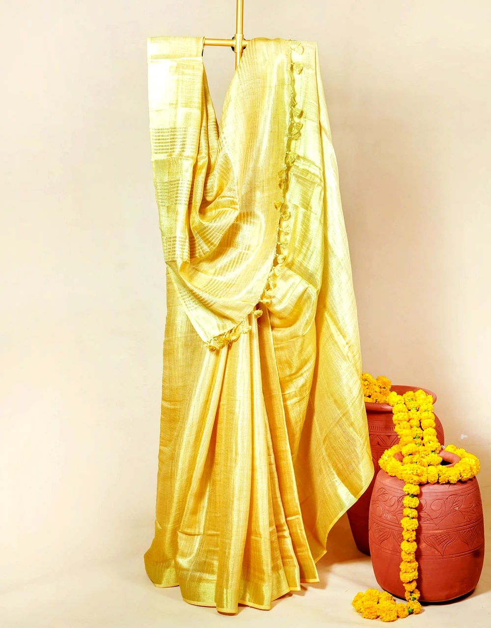 Golden Yellow Tissue Linen Saree With Tassel Pallu