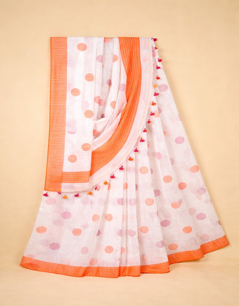 Hovered view of White And Orange Ball Butti Cotton Saree With Contrast Tassel Pallu