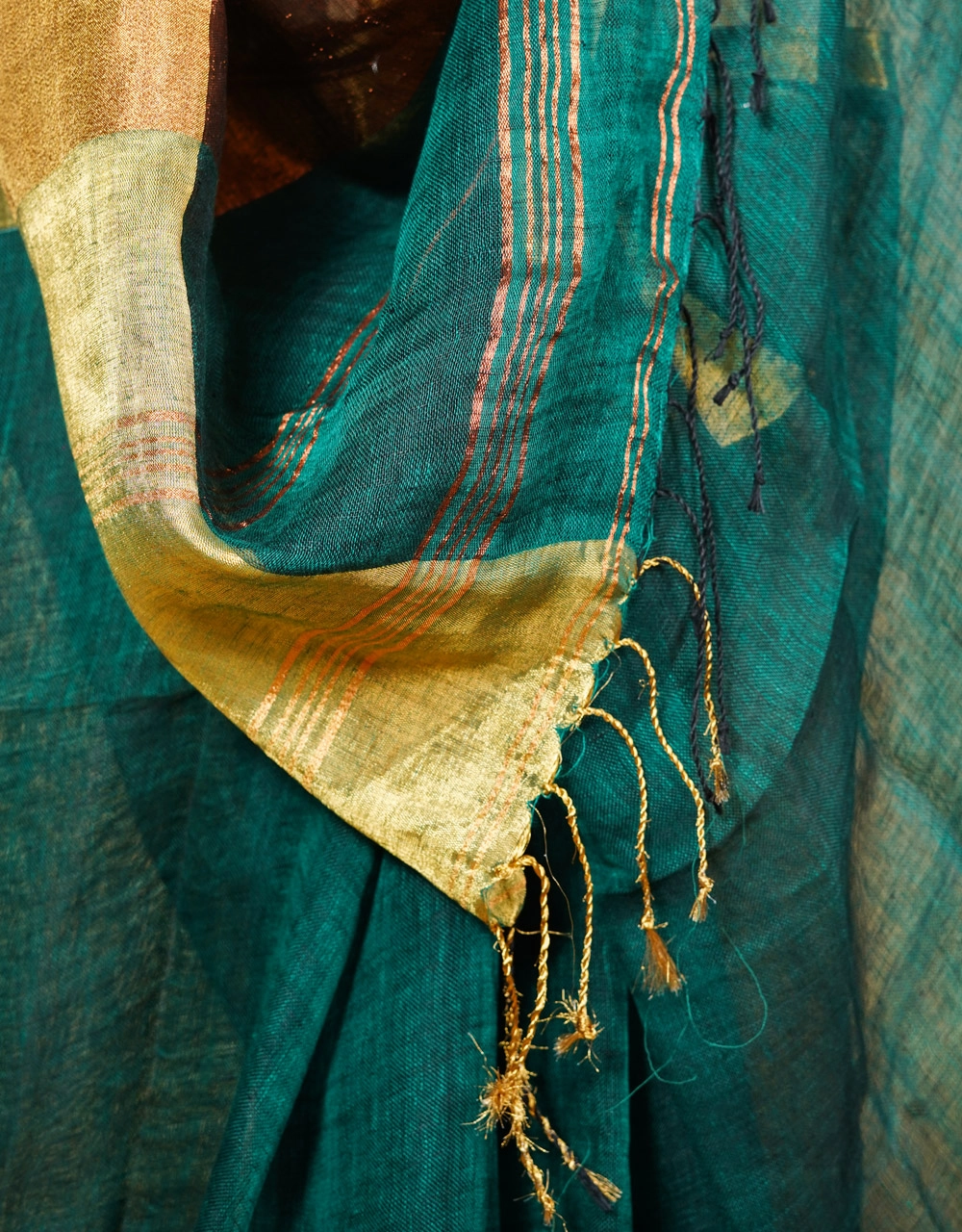 Hovered view of Green Teal Linen Saree With Handcrafted Tassels