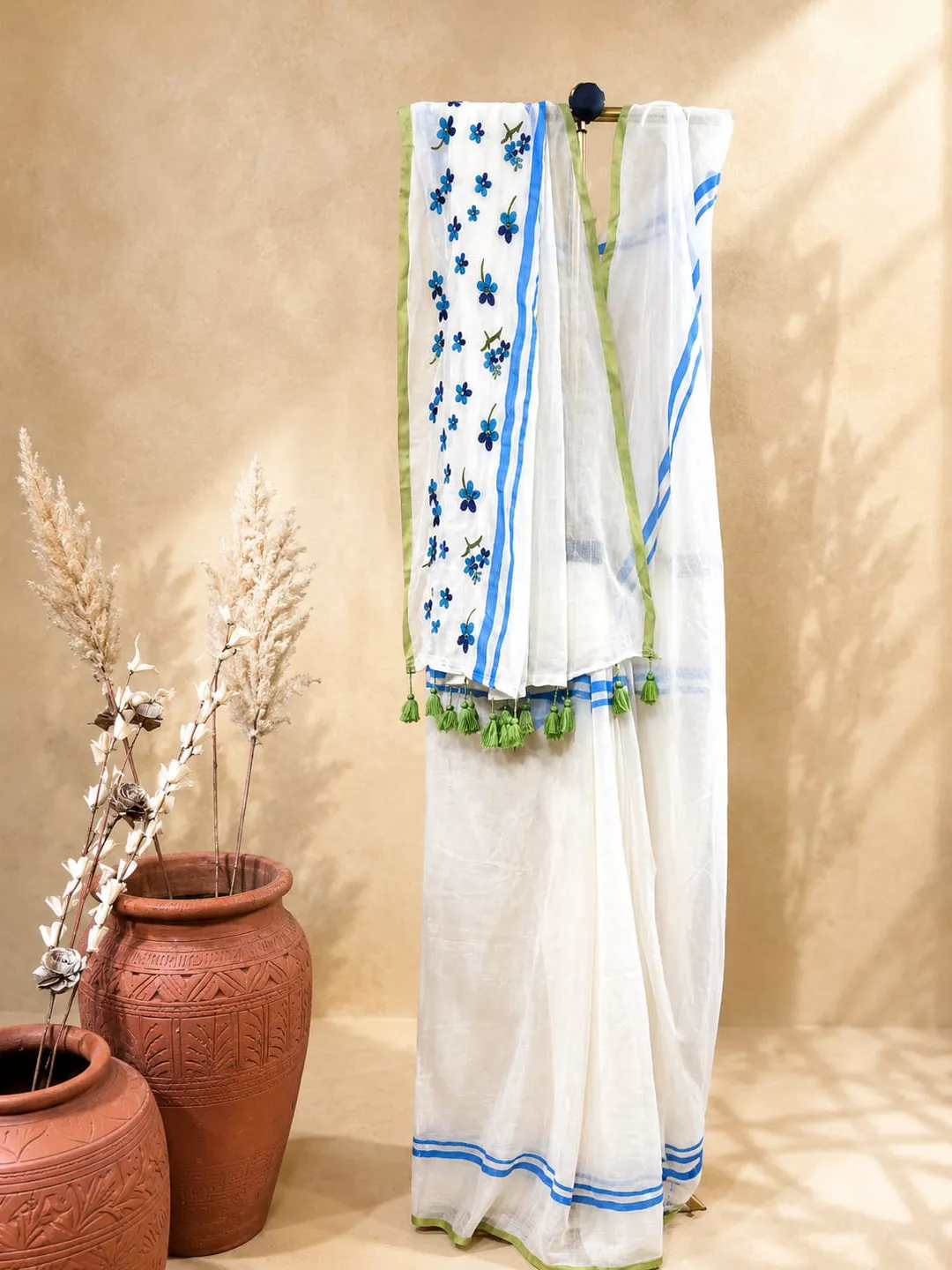 Multicolour Floral Embroidered Mul Cotton Saree With Blue Border & Green Tassels