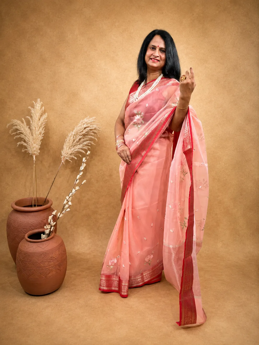 Pink Organza Blend Saree In Peach Pink With Floral Embroidery And Zari Border