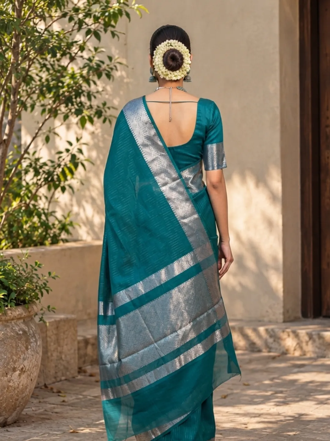 Green Banarasi Tissue Silk Saree Teal Green With Silver Zari Border And Pallu front view