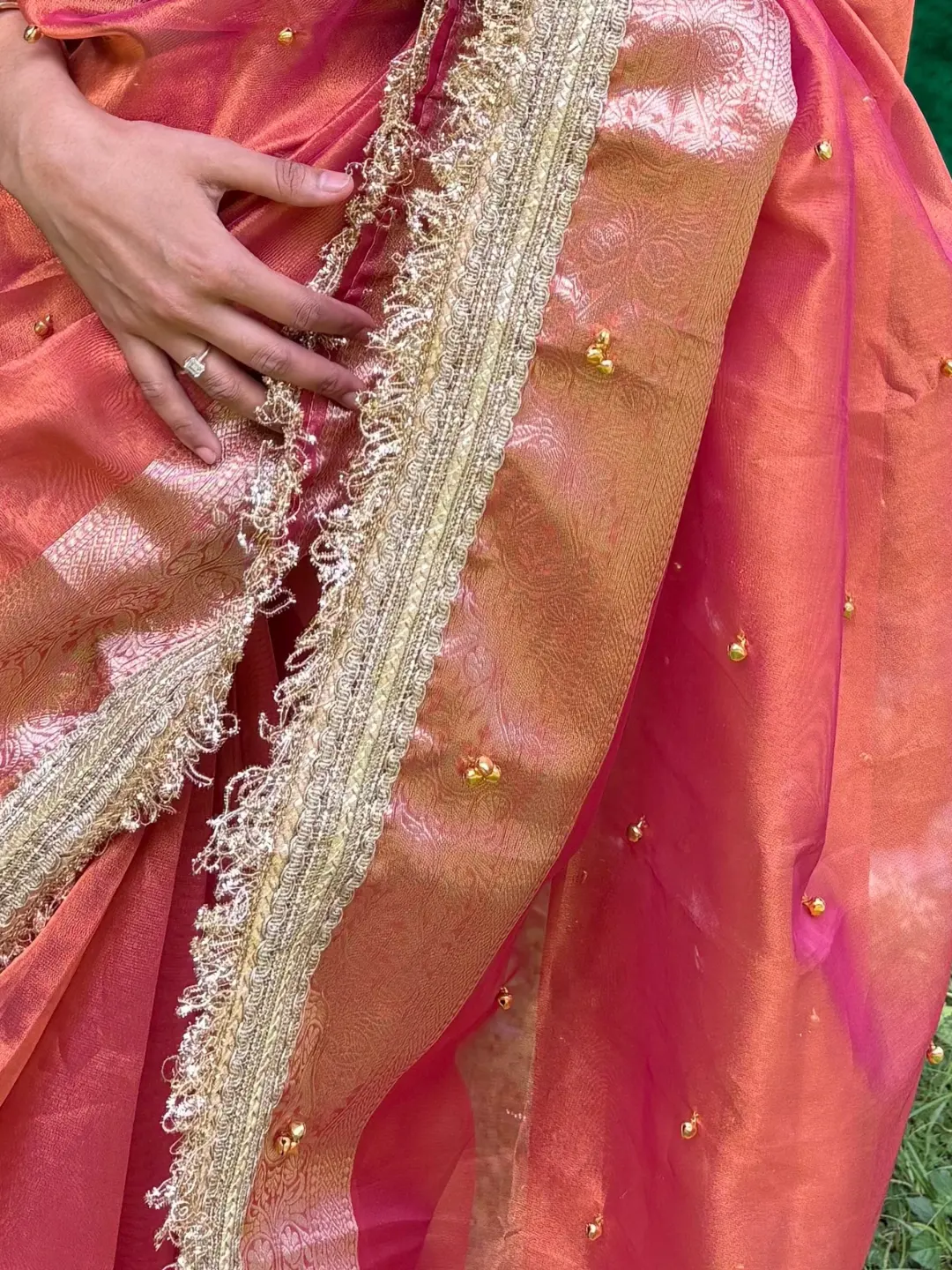 Orange Tissue Silk Banarasi Saree With Ghungru Work front view