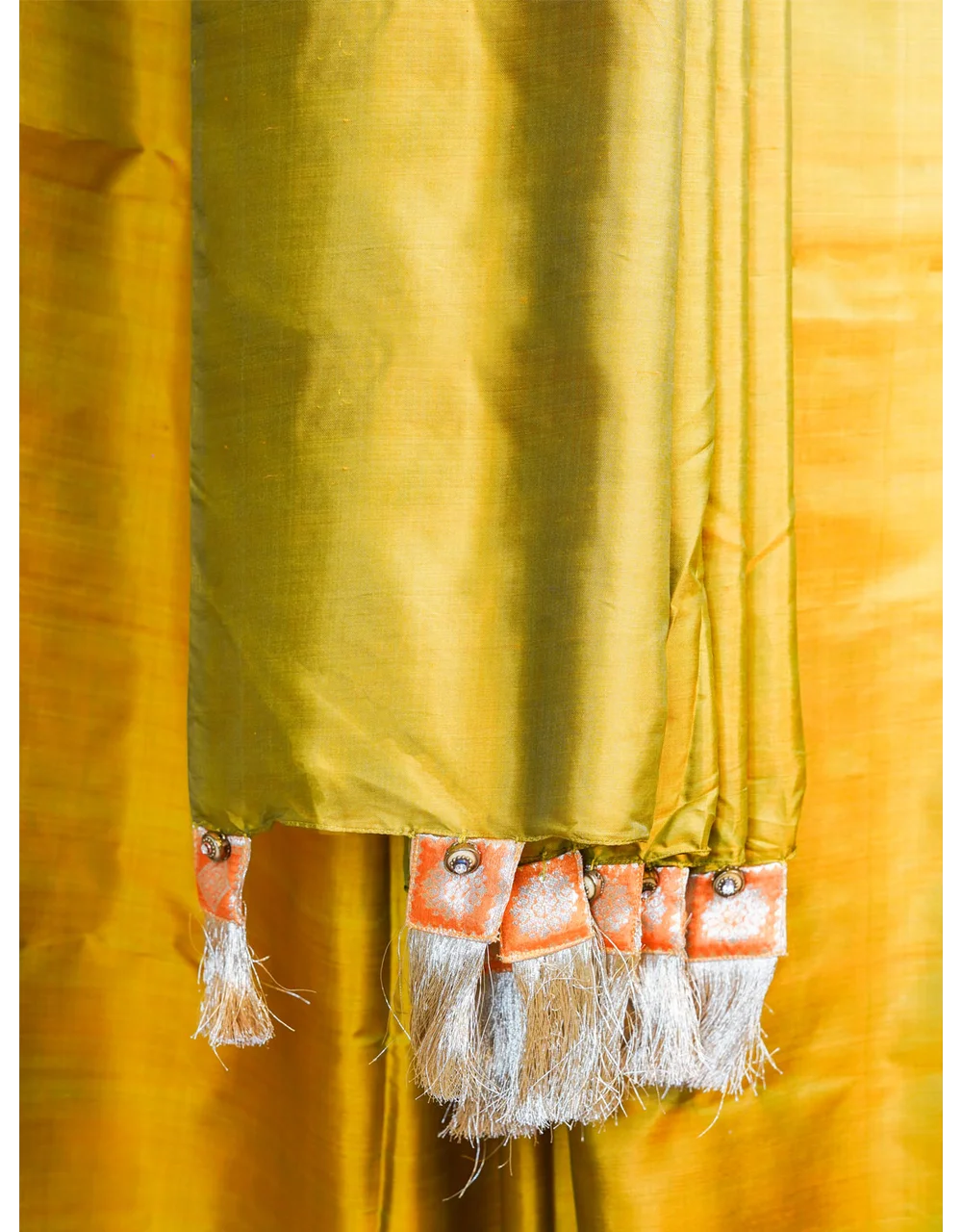 Golden Green Handwoven Silk Saree With Orange Tassel Accents - View 3